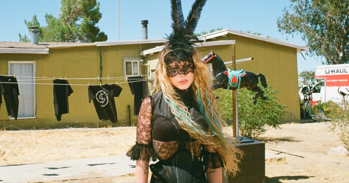 Watch Slayyyter mourn a past love in “brand new chanel$” video